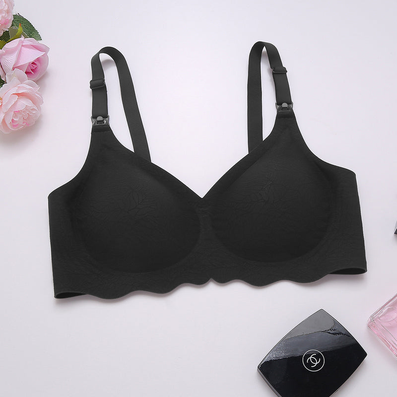 Black seamless maternity bra with adjustable straps. Comfortable & supportive design for nursing.