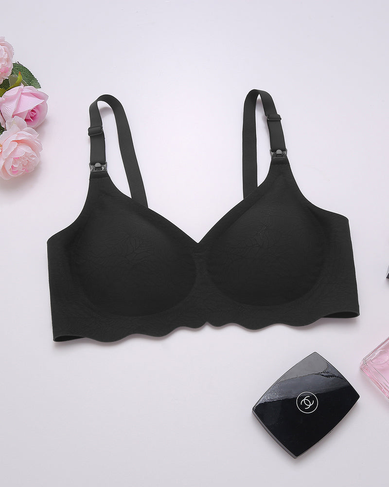 Black seamless maternity bra with adjustable straps. Comfortable & supportive design for nursing.