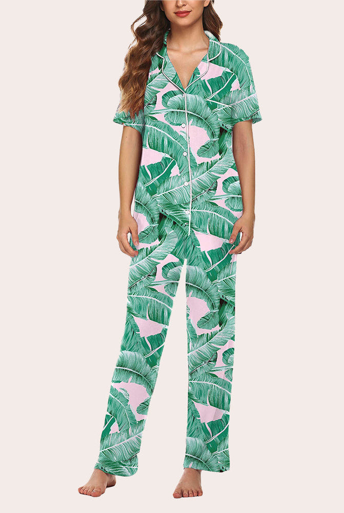 Green leaf print pajama set with button-down shirt and long pants. Comfortable sleepwear.
