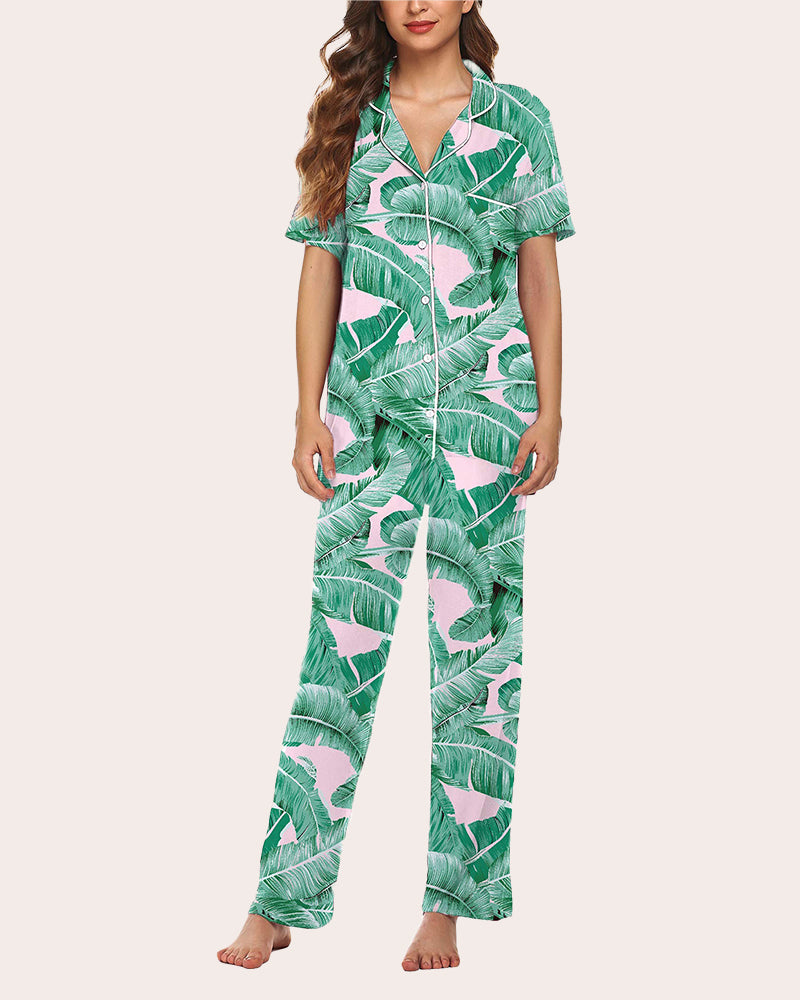 Green leaf print pajama set with button-down shirt and long pants. Comfortable sleepwear.