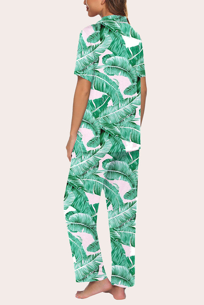 Green leaf print pajama set for women. Button-down shirt and long pants sleepwear