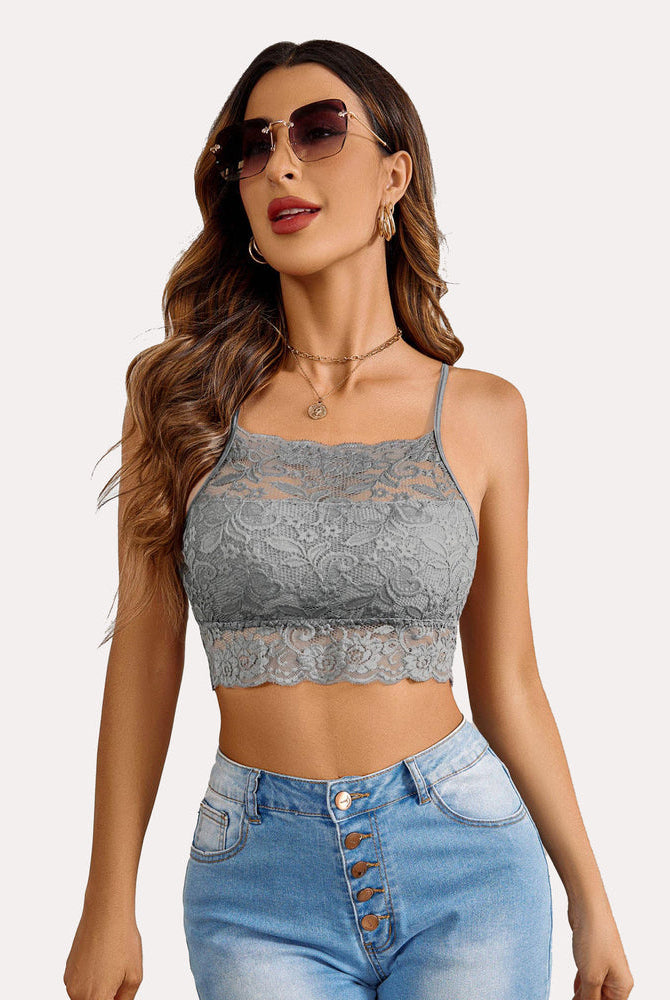 Gray lace racerback bralette with jeans. Stylish and comfortable lingerie with lace details.