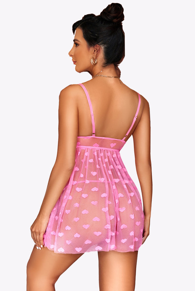 Back view of pink lace mesh babydoll nighty with heart pattern and thin shoulder straps