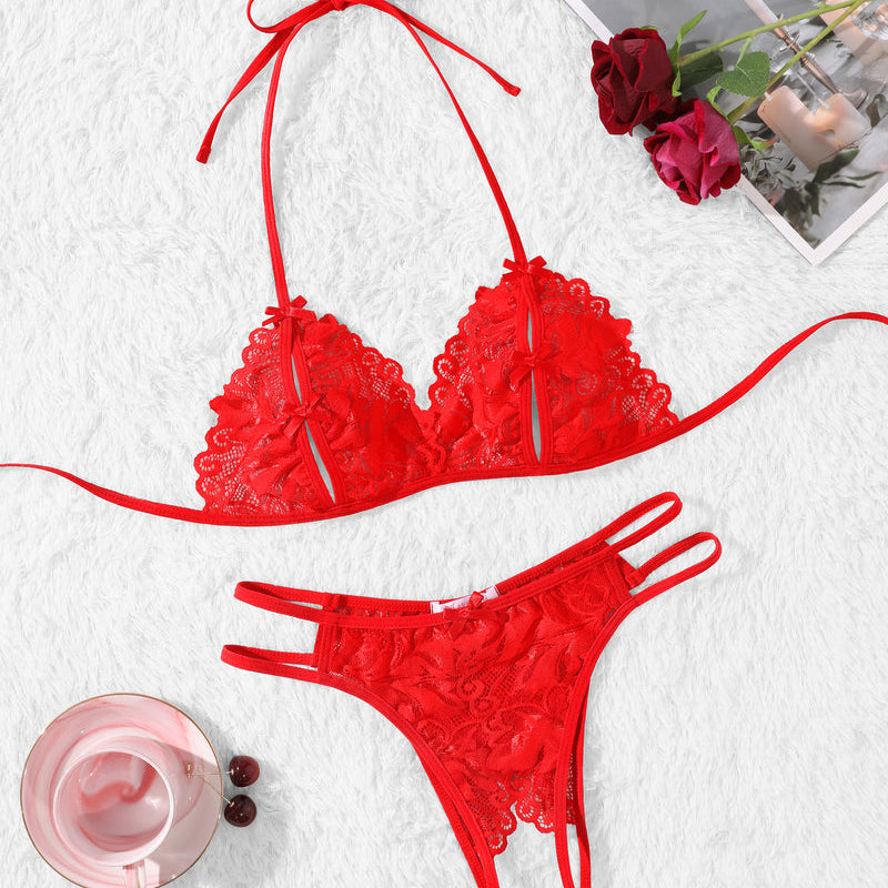 Red lace bra and panty set. Halter tie design, with floral lace details for a playful allure.