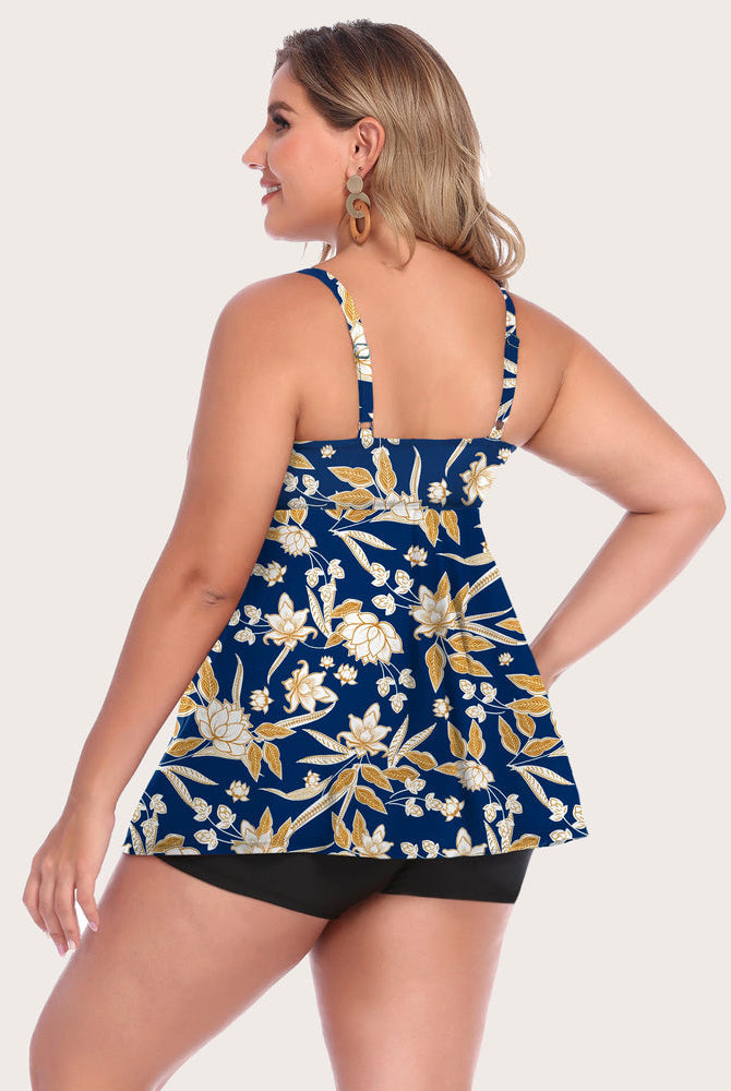 Navy floral tankini swimsuit with adjustable straps. Retro swimwear for sun protection.