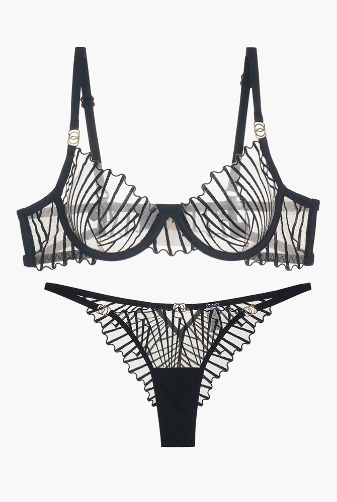 Black lace lingerie set. Embroidered bra and panty with adjustable straps and a seductive design.