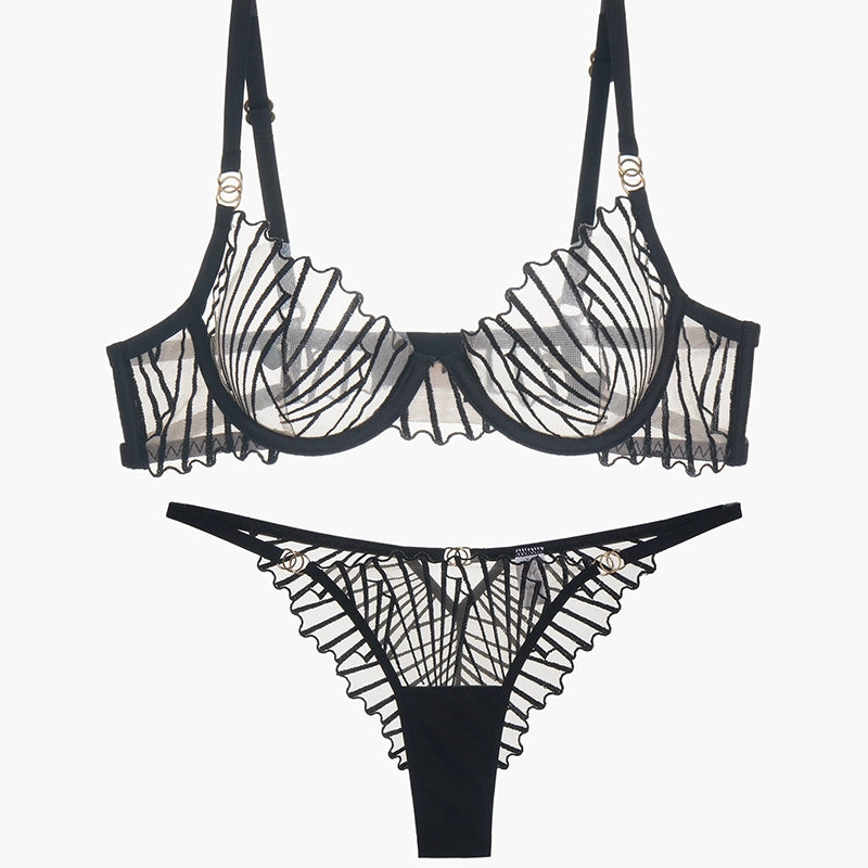 Black lace lingerie set. Embroidered bra and panty with adjustable straps and a seductive design.