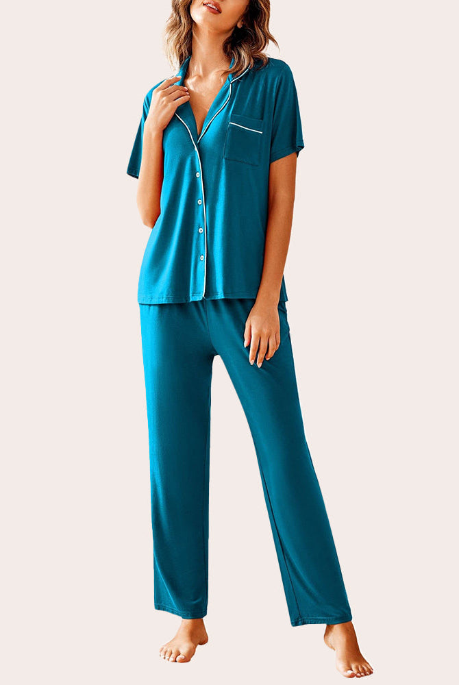Teal pajama set for women. Button-down shirt and long pants. Comfortable sleepwear.