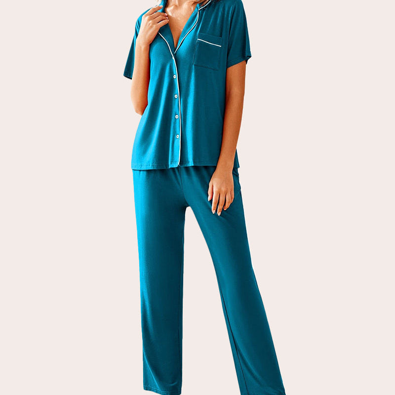 Teal pajama set for women. Button-down shirt and long pants. Comfortable sleepwear.