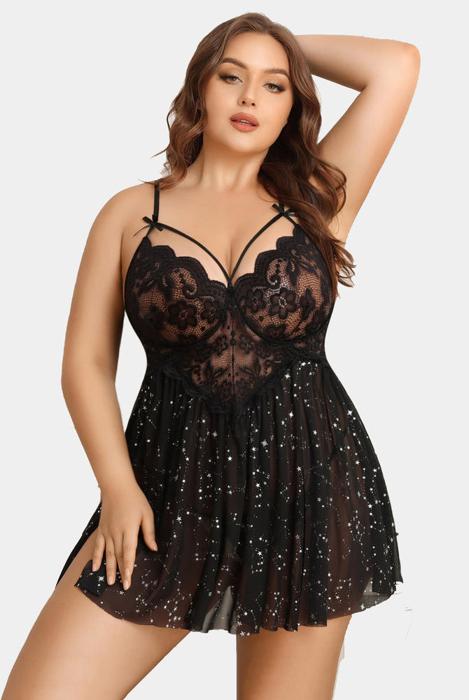 Plus size black lace babydoll lingerie with adjustable straps and high slit, model is wearing.