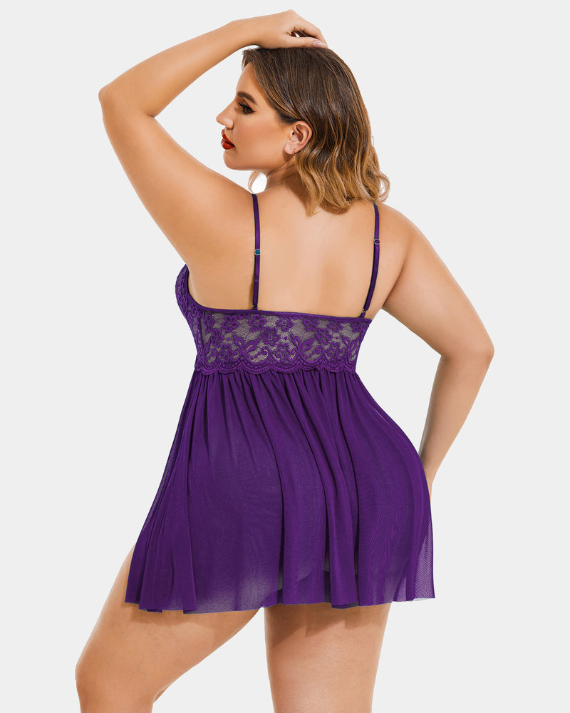Plus size purple babydoll lingerie with lace detail, mesh side slit and adjustable straps.
