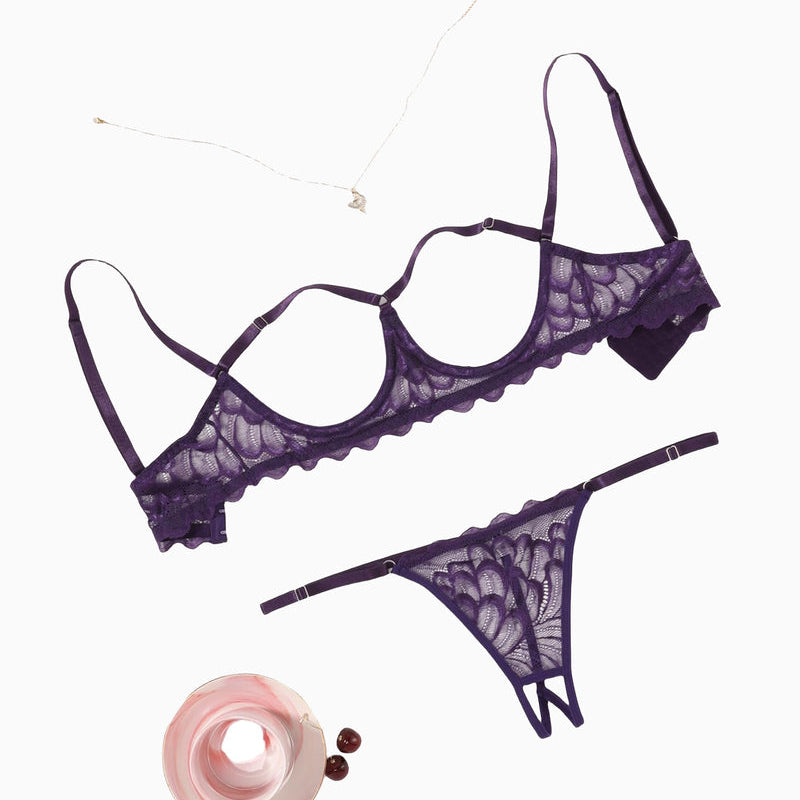 Lace bra and thong-style panty set, scalloped trim, dark purple, flat lay.