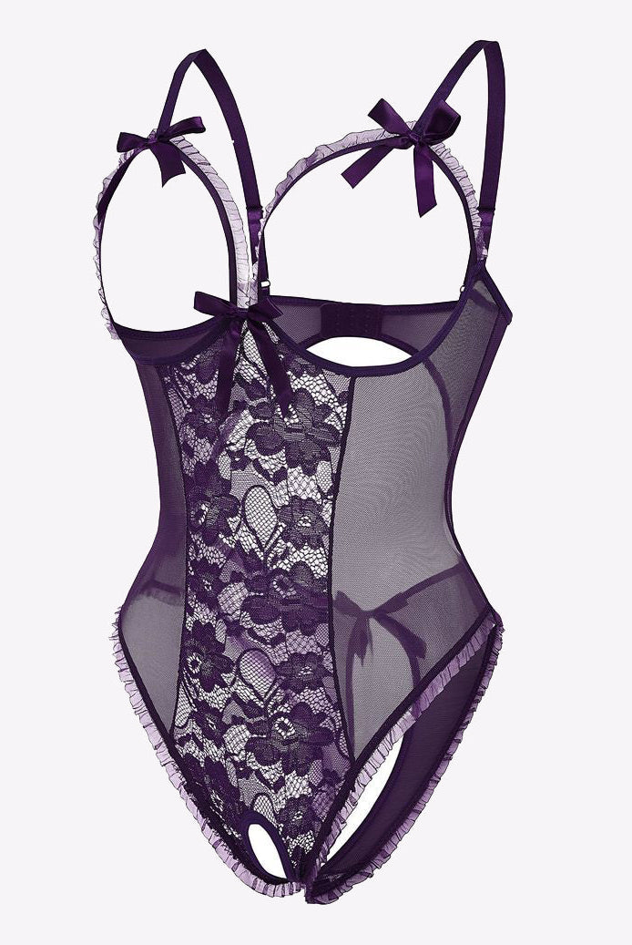 Purple lace cut-out bodysuit with adjustable straps, open back, and bow details. Sexy lingerie.