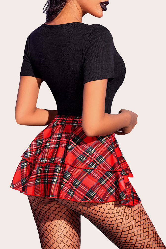 Red plaid mini ruffle skirt with black top, fishnets. Confident and sexy lingerie.