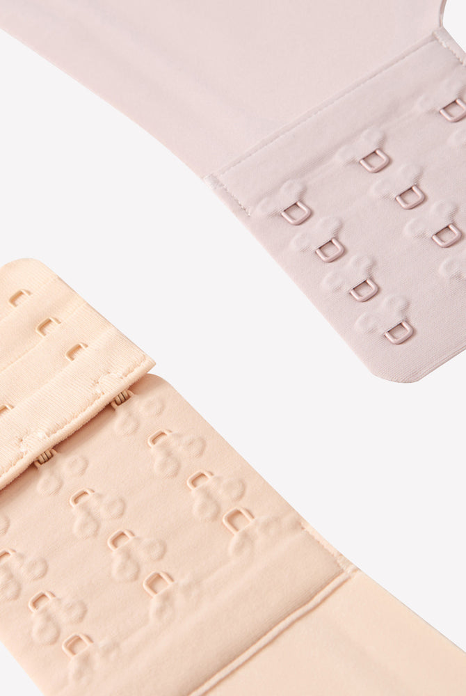Beige wireless push-up bra hook and eye closure, seamless smoothing, adjustable support