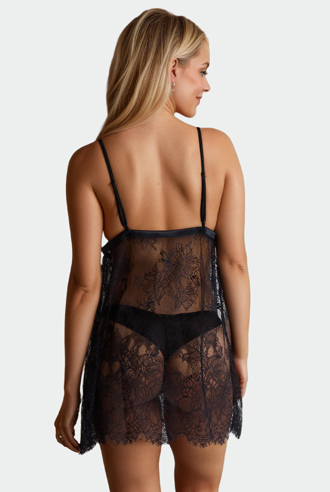 Black lace babydoll with floral design and adjustable straps, perfect for intimate evenings.