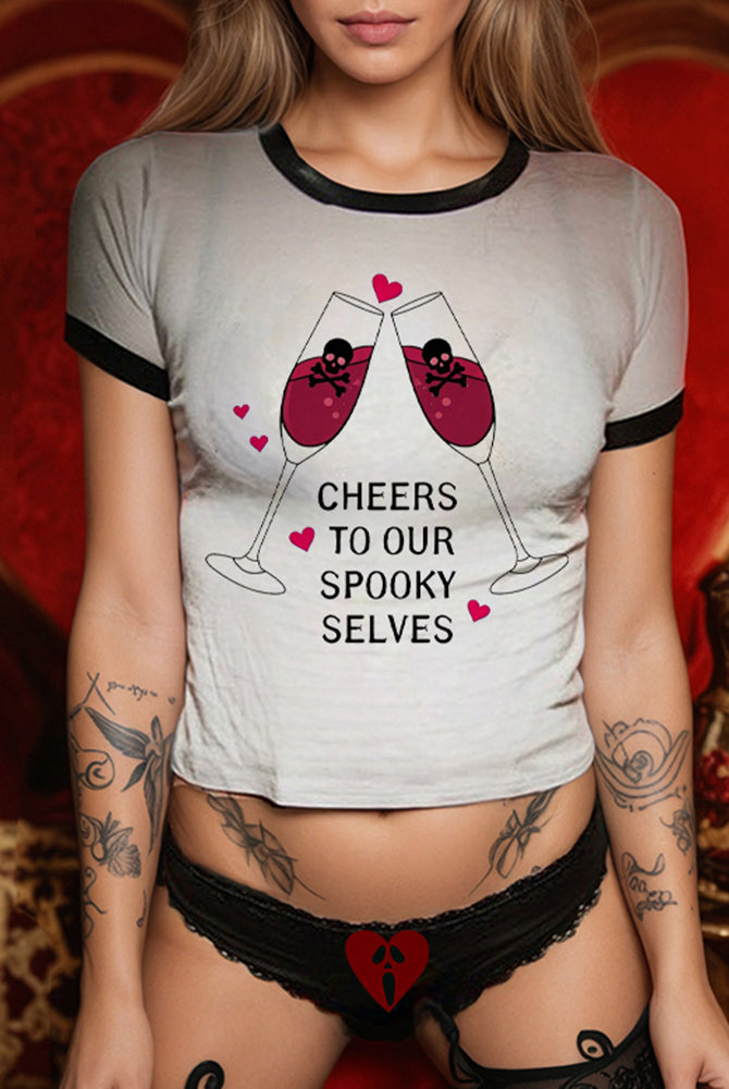 Street style Halloween crop top and briefs set with "Cheers To Our Spooky Selves" graphic