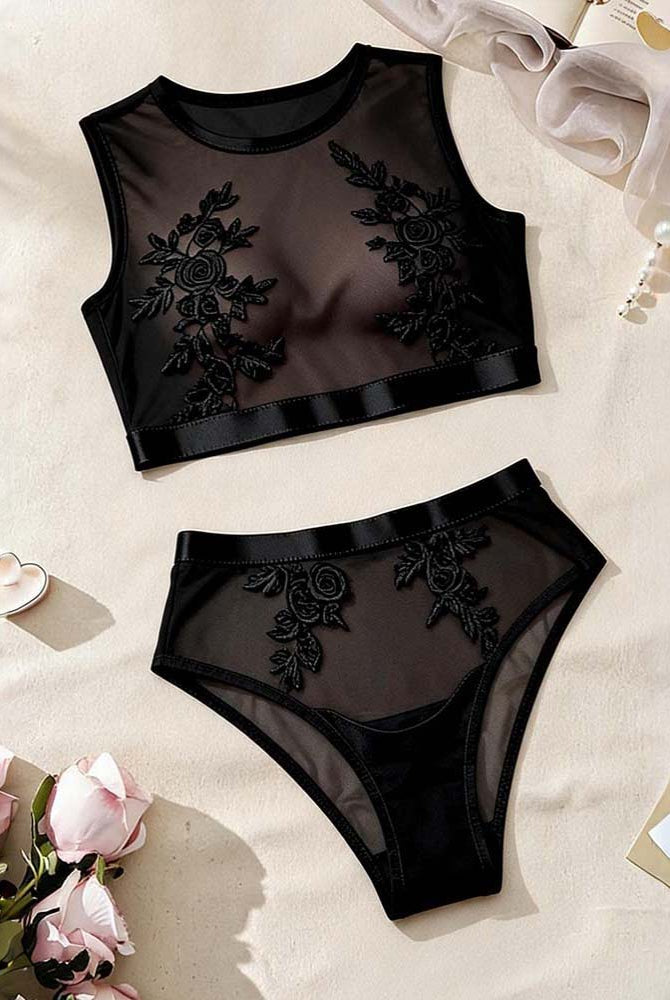 Black floral embroidery mesh bra and panty set, flat lay