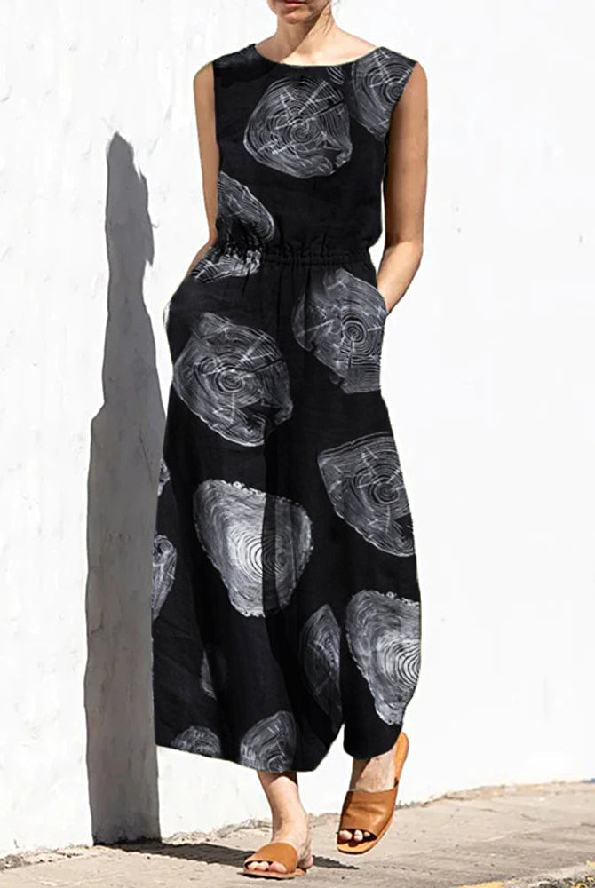 Black printed sleeveless wide-leg long jumpsuit with elastic waist and crew neck