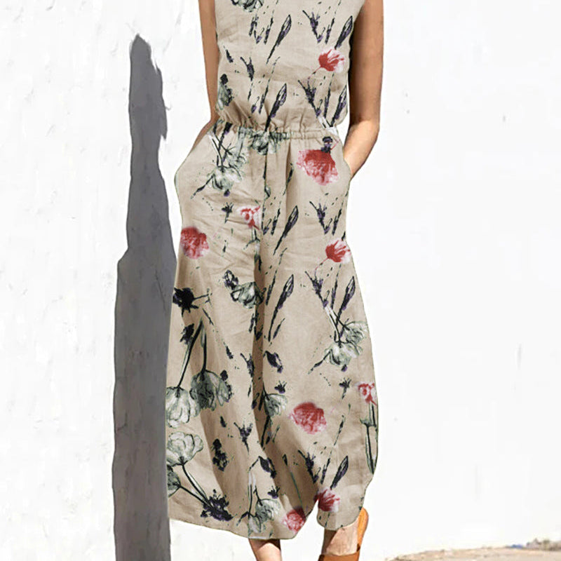 Light beige floral printed sleeveless wide-leg long jumpsuit with elastic waist and crew neck