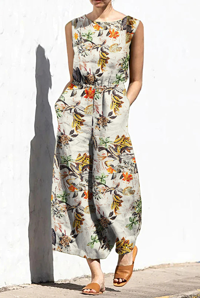 Ivory botanical print sleeveless wide-leg long jumpsuit with elastic waist and crew neck