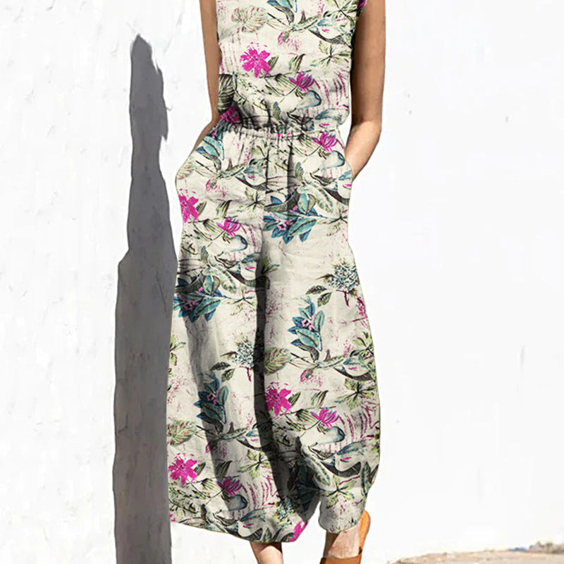 Cream floral print sleeveless wide-leg long jumpsuit with elastic waist and crew neck