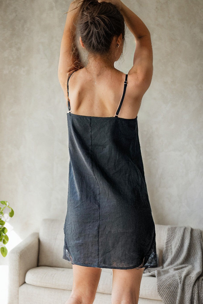 Black linen slip dress with adjustable straps and lace hem, made of 100% linen for a comfy night.