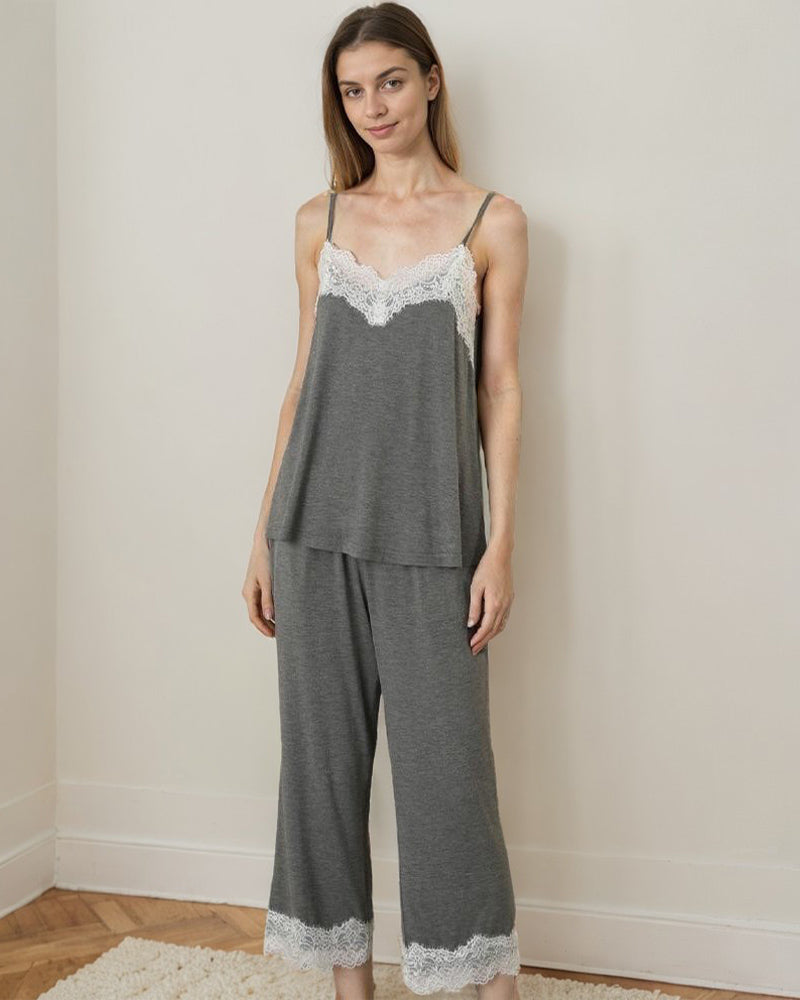 Gray two-piece pajama set with lace trim; soft and comfortable loungewear for women.