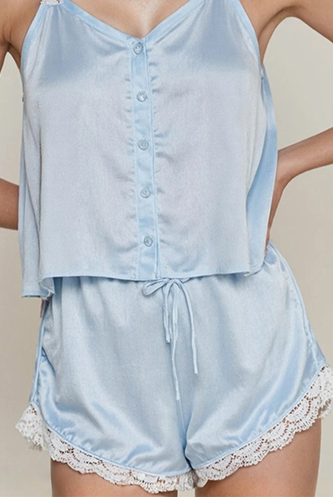 Light blue satin sleep shorts with drawstring waist and lace-edged hem