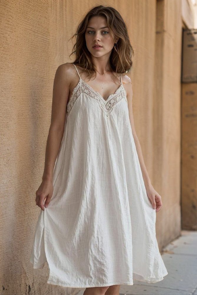 White cotton linen nightdress with lace detail, perfect for comfortable sleepwear.