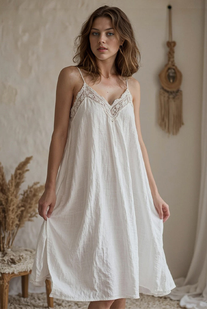White cotton linen nightdress with lace, offering comfort and style for a dreamy night.