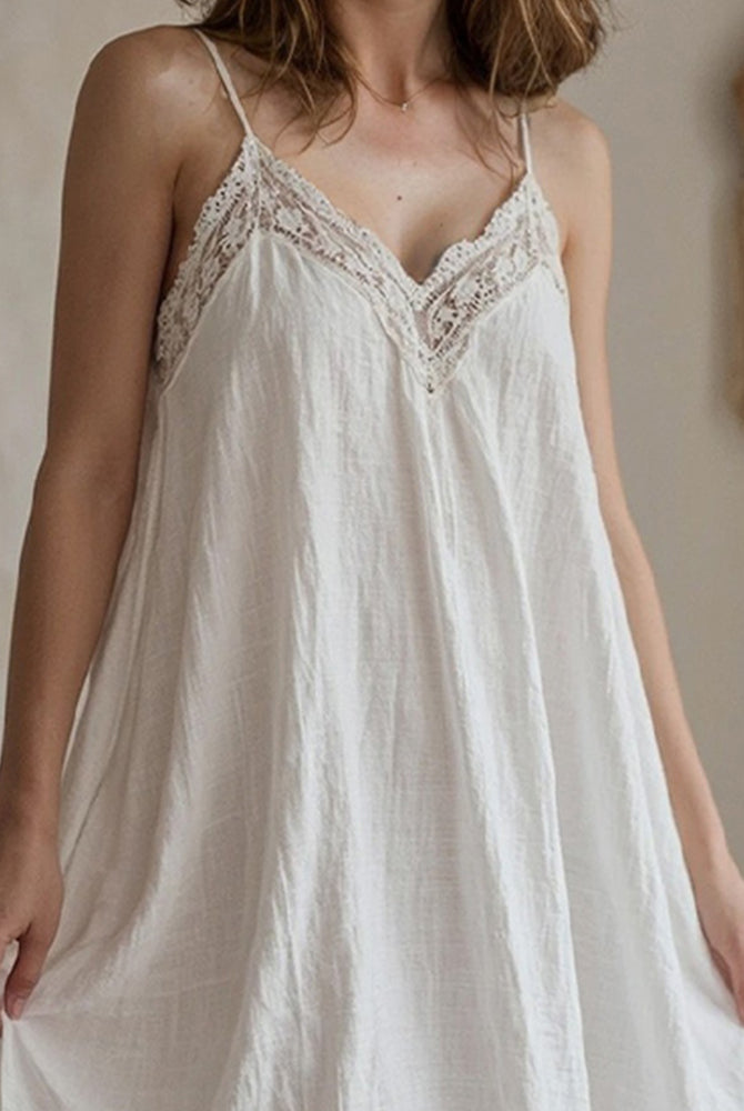 White cotton linen nightdress with lace detailing, perfect for comfortable and stylish sleepwear.