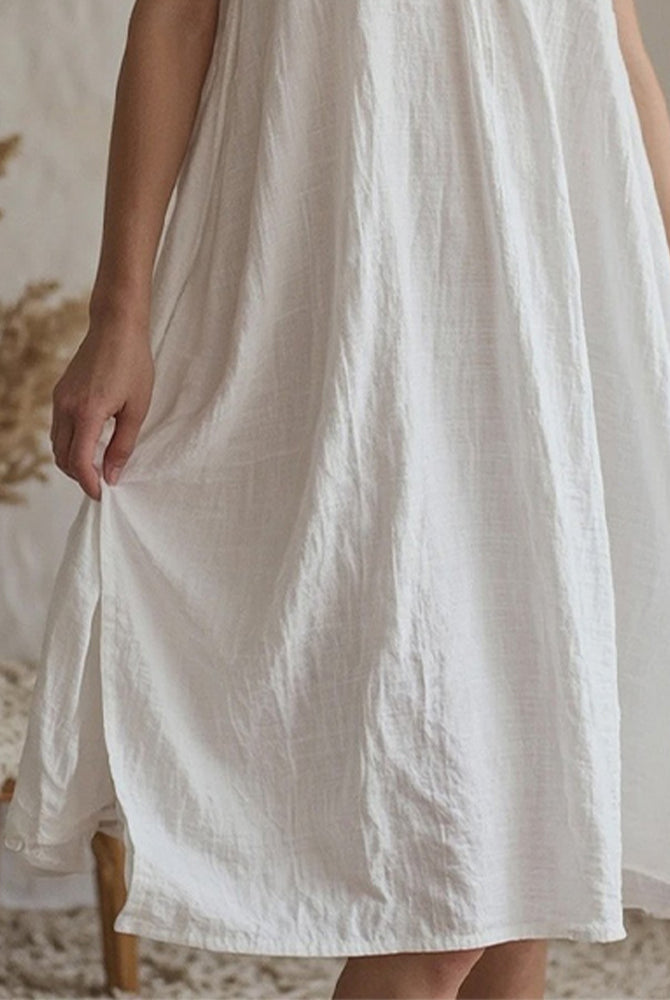White cotton linen nightdress with side slit, perfect for comfortable sleepwear