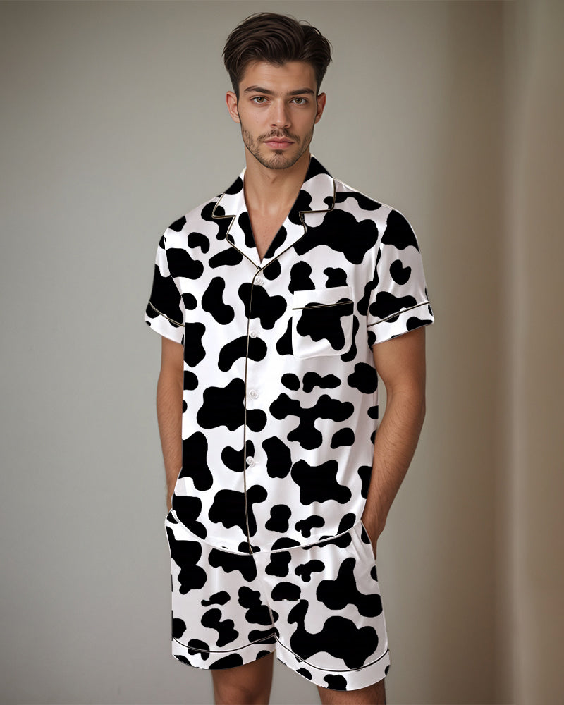 Men's satin pajama set with cow print. Comfortable short-sleeved shirt and shorts. Silk fabric.