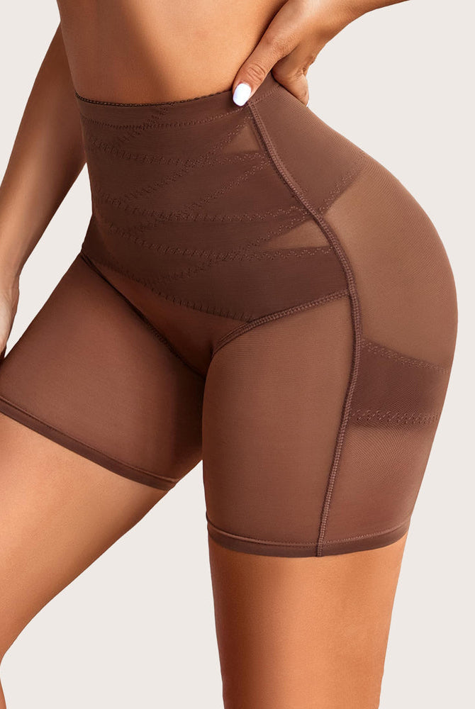 Brown shapewear shorts with tummy control and butt lift, featuring mesh for a smoothing silhouette