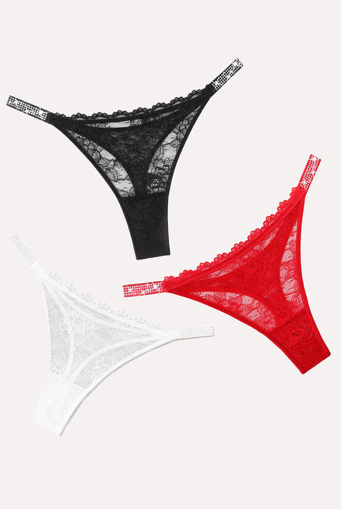 Lace thongs with rhinestone straps in black, red, and white colors. Sexy lingerie for women.