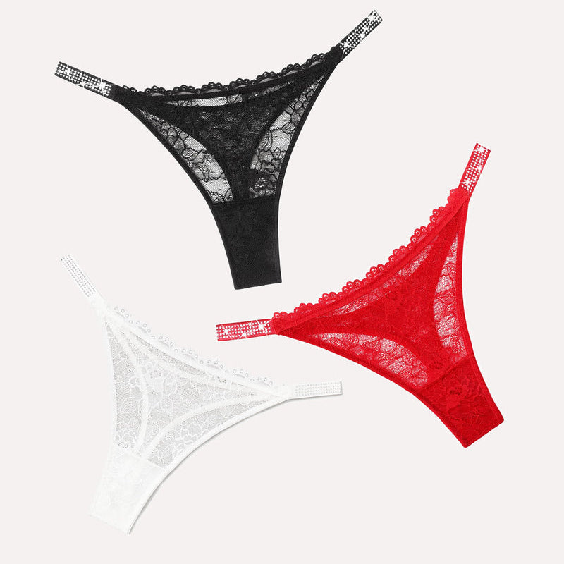 Lace thongs with rhinestone straps in black, red, and white colors. Sexy lingerie for women.