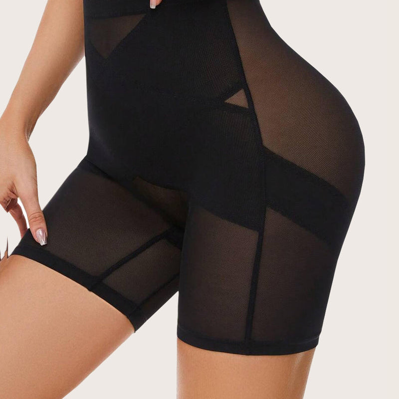 Black shapewear shorts: high-waisted design with tummy control, butt lift, smooth silhouette.