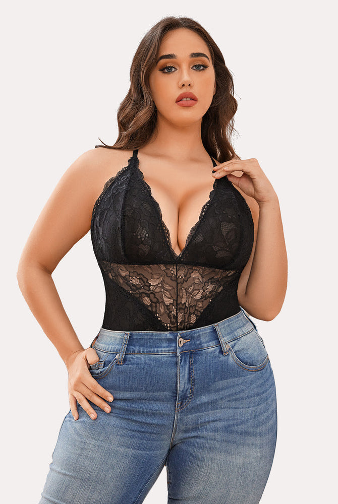 Black lace bodysuit with deep V-neck, paired with blue jeans, a sexy lingerie for women. Avidlove