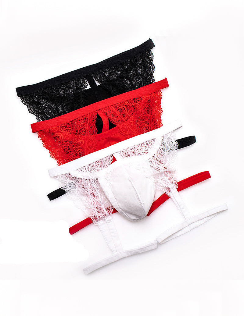 Set of lace thongs with leg harness straps in black, white, and red