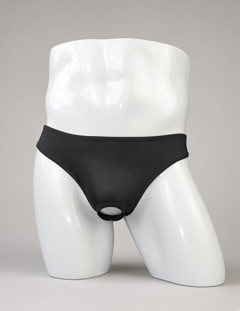 Black sheer men’s G-string thong on a white mannequin