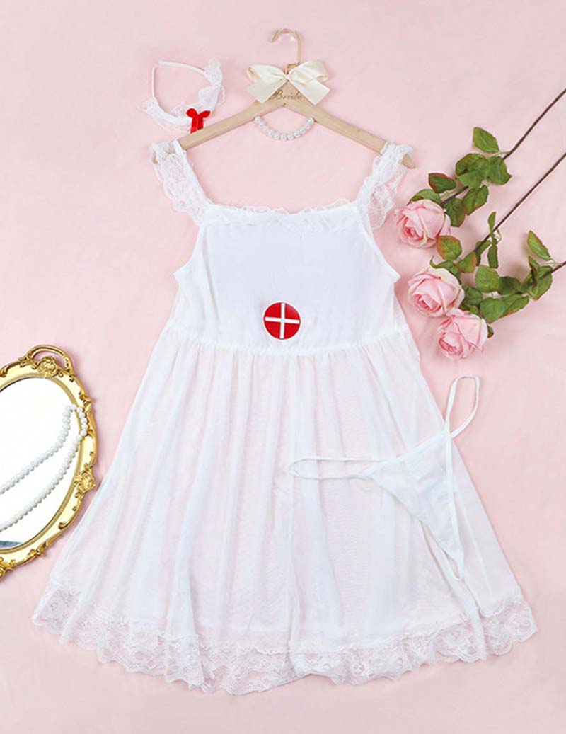 White lace-trim babydoll dress with red cross chest emblem, hanging on pink background
