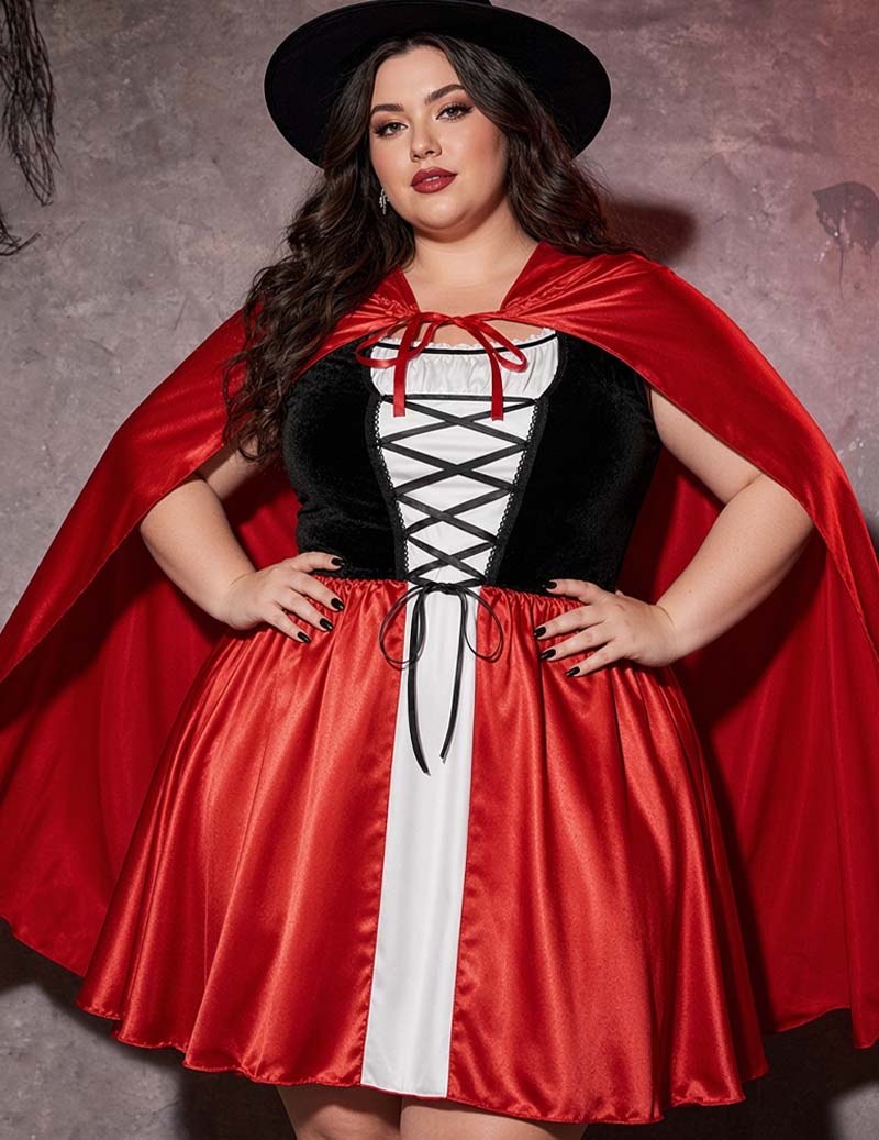 Plus-size witch dress with red skirt, black bodice, crisscross white lacing, and cape