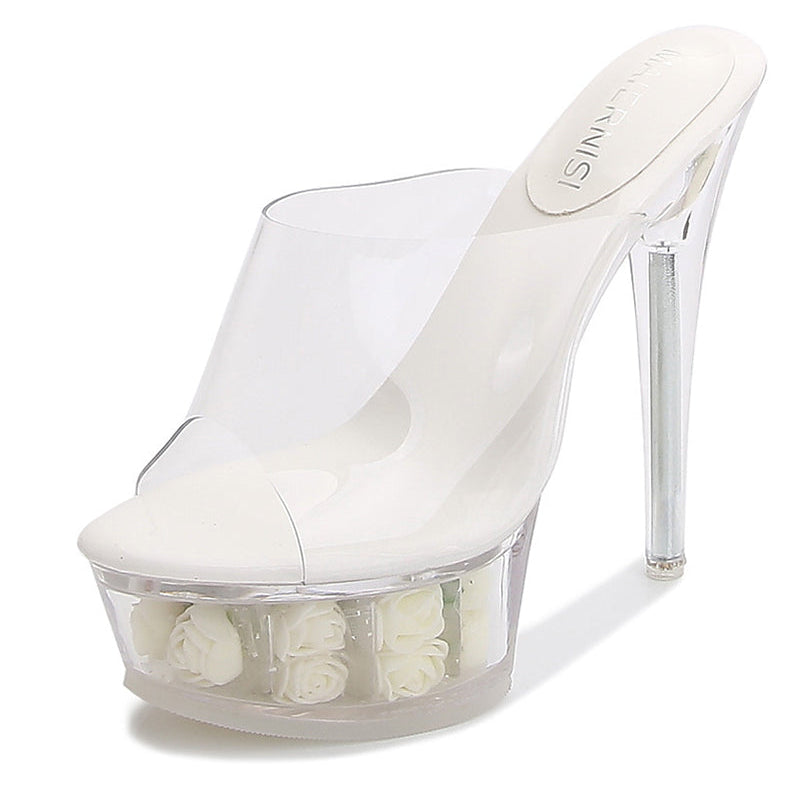 Clear platform mule sandal with white rose flowers and a high stiletto heel