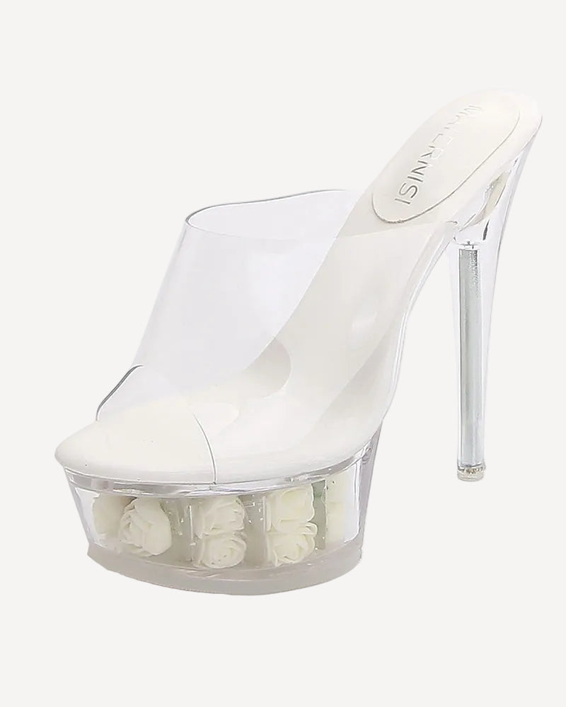 Clear platform mule sandal with white rose flowers and a high stiletto heel