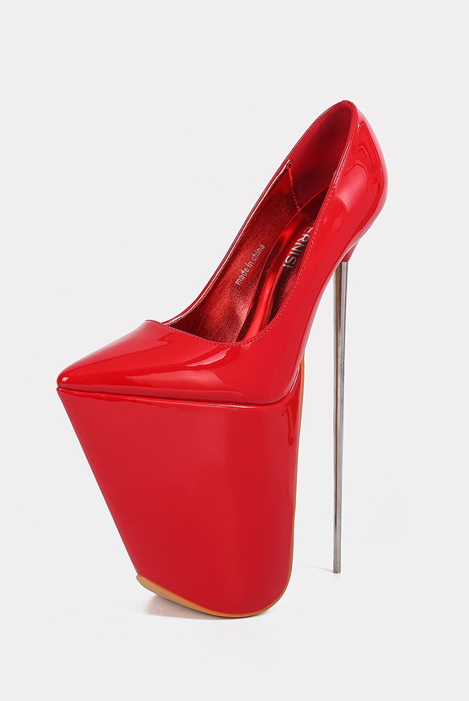 Red patent platform stiletto pump with pointed toe and tall thin stiletto heel