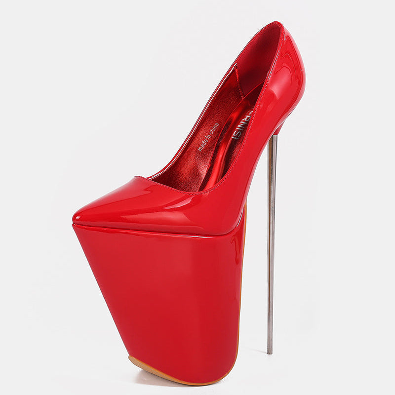 Red patent platform stiletto pump with pointed toe and tall thin stiletto heel