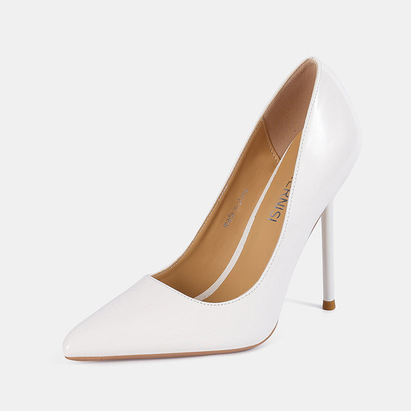 White patent leather pointed toe stiletto pump with smooth glossy upper