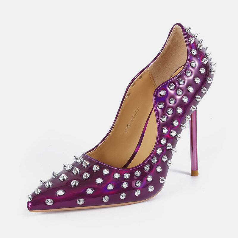 Purple patent pointed-toe stiletto pump with silver spike studs, high heel