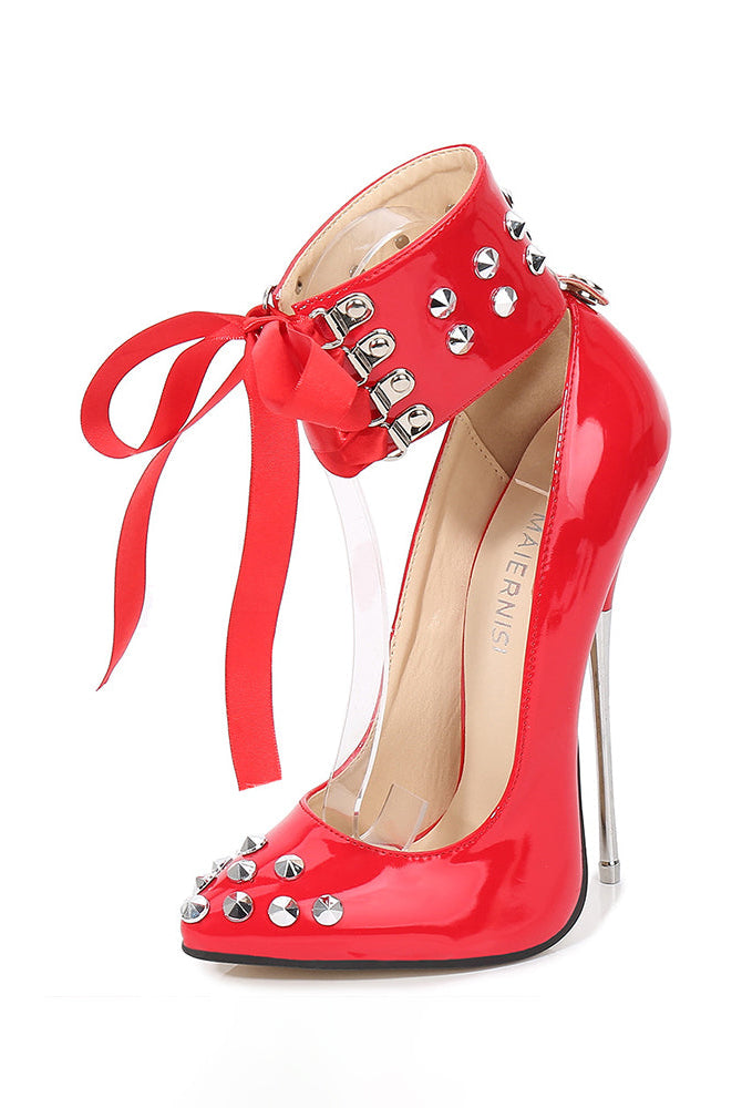 Red patent pointed-toe stiletto pump with spike studs, ankle strap and ribbon tie